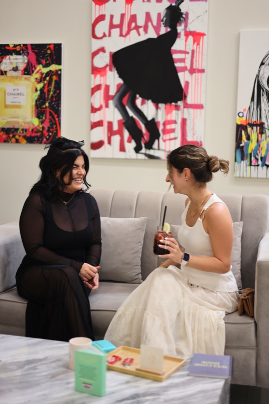 Women in the salon by the authentic beauty wall